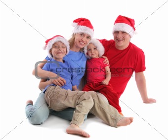 Happy family in Christmas hats