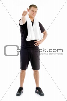 muscular male with thumbs up