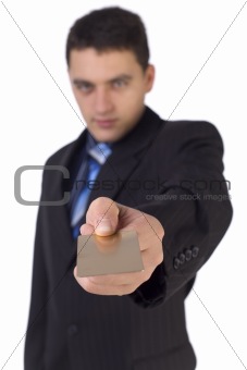 Businessman giving gold card