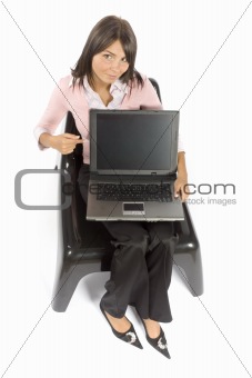  woman sitting; displays computer screen