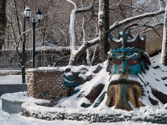 neptune fountain in winter town park