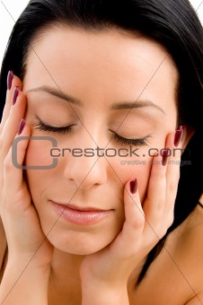 close up of face of woman on white background