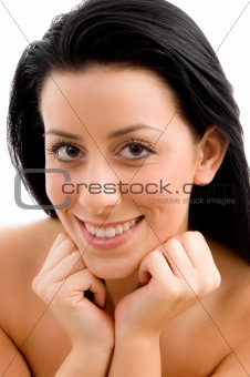 close up of smiling young woman with white background