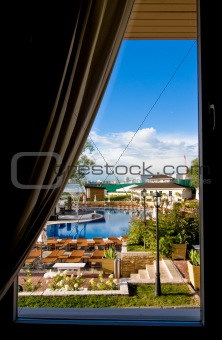 Beautiful view from the window on swimming pool