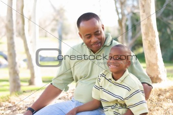 Man and Child Having fun in the park.
