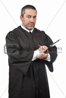 Serious male judge writing