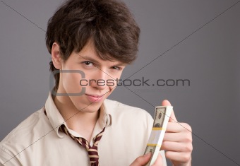Young businessman with money