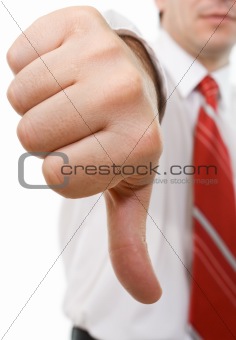 Businessman with thumbs down