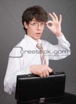 Young businessman with brief case 