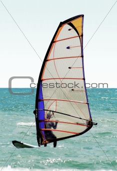 Silhouette of a windsurfer on the sea