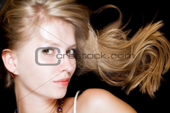 Portrait of the beauty blonde. Isolated on black background
