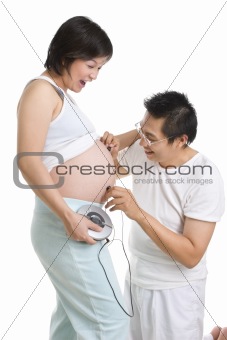 Pregnancy with couple  music stimulation