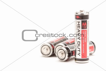 Group of Heavy Duty AA Batteries on a White Background.