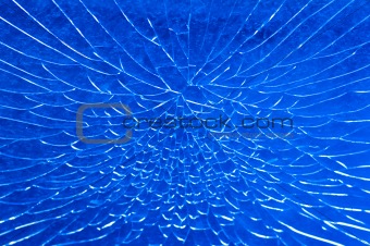 broken window with net shaped cracks