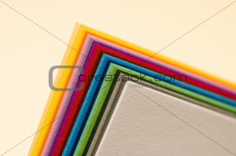 office - detail of pile of colourfull papers 