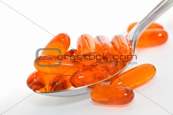 Pharmaceutical concept - pills in spoon