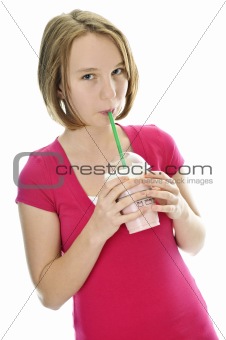Teenage girl with milkshake