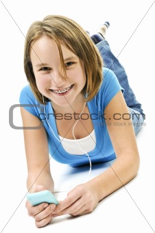 Teenage girl listening to music