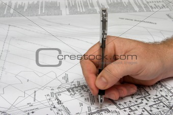 Architect drawing a plan.