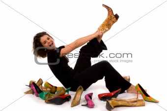 Pretty young, attractive lady trying on shoes