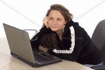 female teenager wondering at the laptop