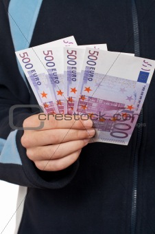 Teenager showing a fan money
