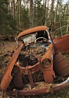 Rusty abandoned car