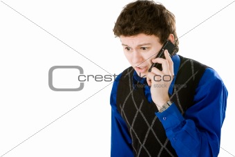 Upset man talking with mobile phone