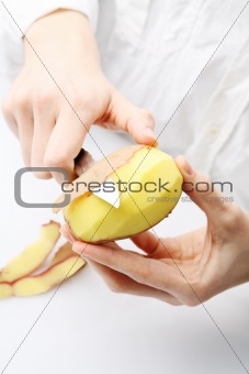 Peel a potato.