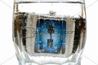 Waterproof (water-resistant) watch in glass with water.