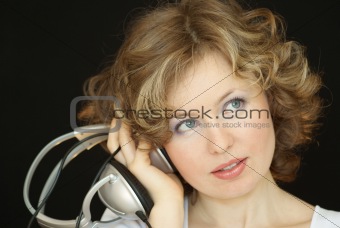 The young girl with headphones