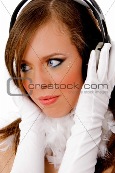 close view of model listening music