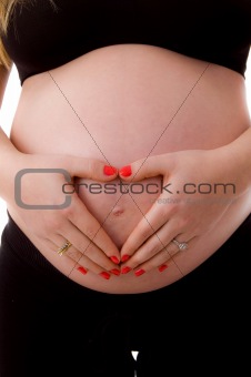 close up of pregnant woman with her tummy