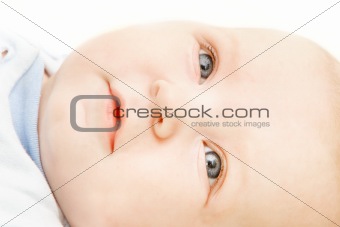 close up baby portrait over white