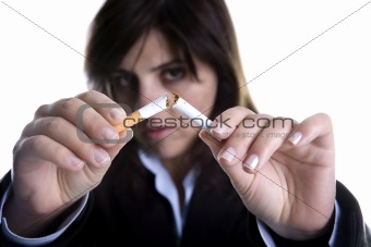 woman breaking cigar - anti-tobacco concept