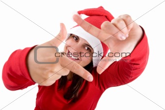 young santa woman in red costume doing a photo frame with her ha