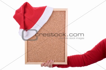 hand holding empty frame with red santa hat