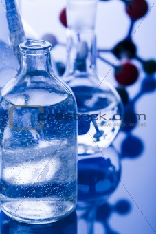 Glass in laboratory and atom