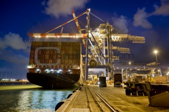 cargo ship by night