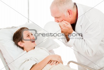 Boy Laughs at Doctor