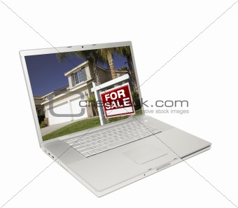 Home for Sale Sign & New Home on Laptop Isolated on a white Background.