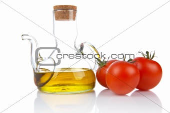 Tomatoes and oilcan