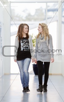 Two girls walking