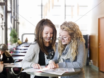 Two girls studying