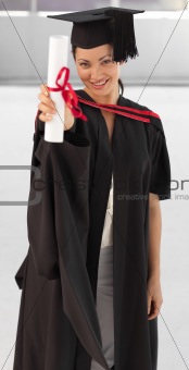 young woman Graduating holding her Diploma
