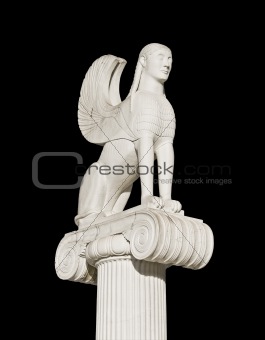 Large ancient Greek sphinx statue fixed on an ionic pillar capital