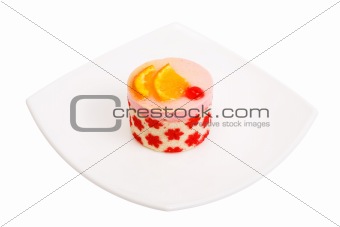 Cake with a cherry and an orange 