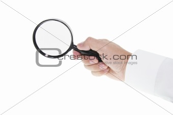 Hand Holding  Magnifying Glass
