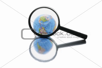Globe under Magnifying Glass