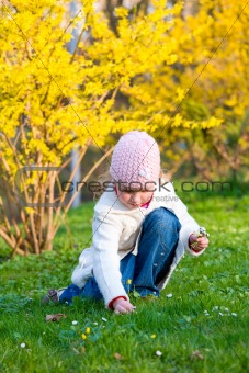small girl in spring park